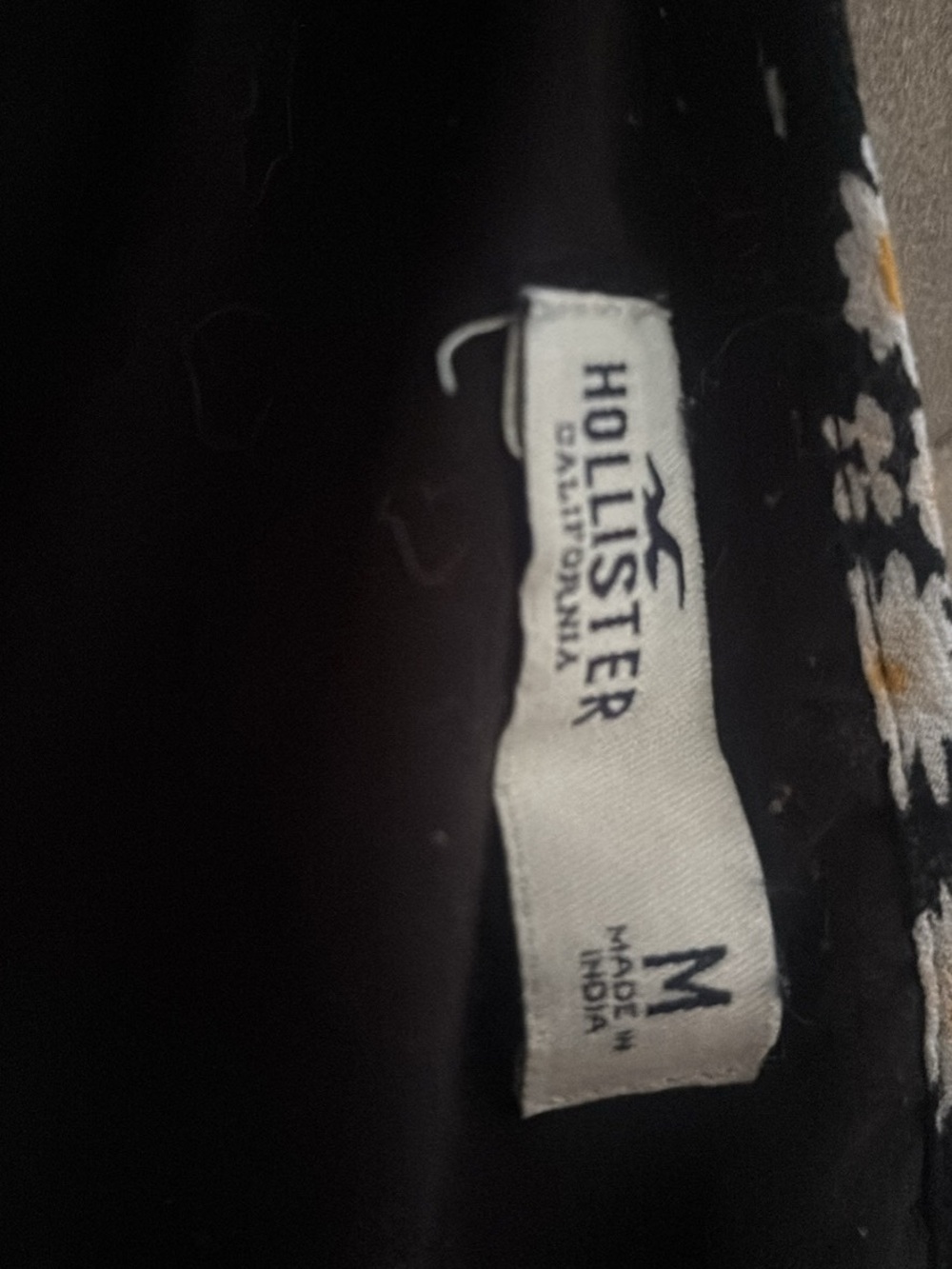 Hollister Black Floral dress with tie strings in front.